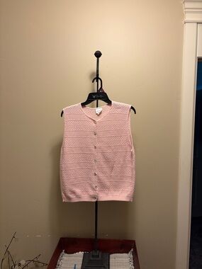 Katherine Bishop sleeveless button up vest.